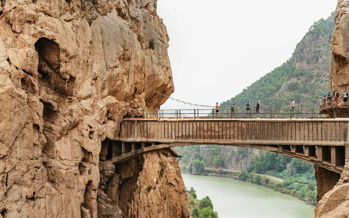 The Caminito del Rey boardwalk bolted to a vertical cliff above the Guadalhorce river